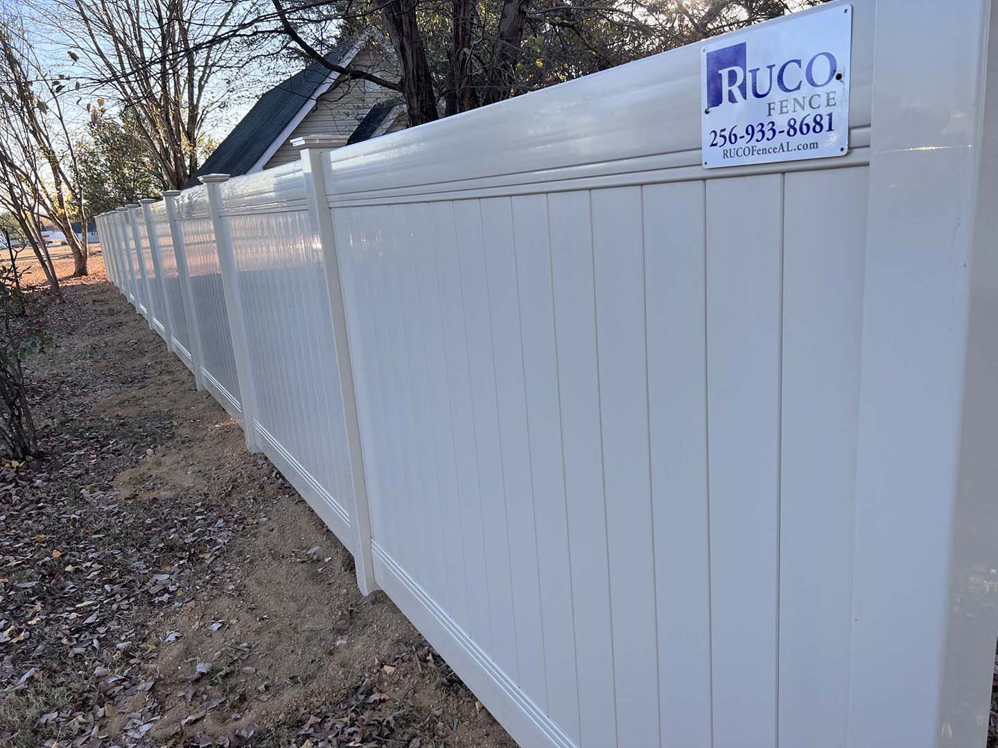 White vinyl residential privacy fence in Huntsville Alabama